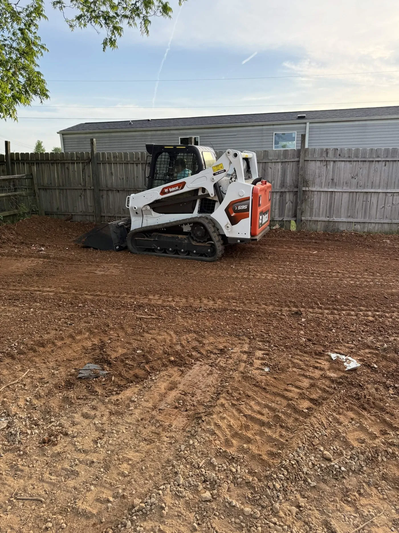 A levelled and graded back yard finished ready for seed